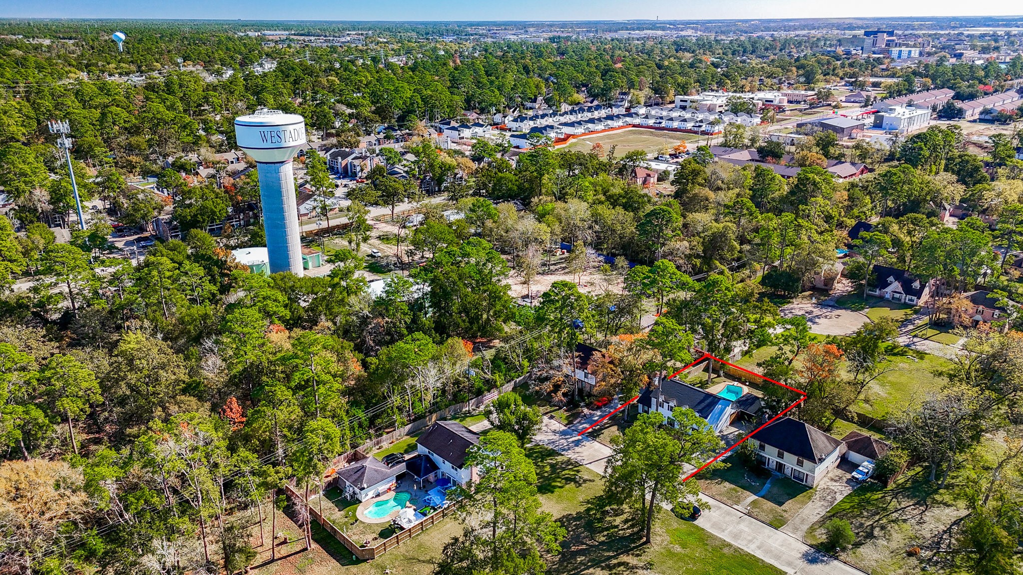 1007 Maranon Lane Houston, TX 77090 - Photo 36 of 36 a view of a city with lush green forest