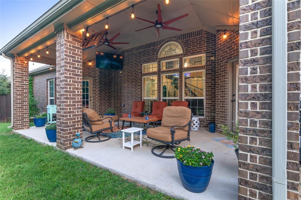 6809 Edwards Road Denton, TX 76208 - Photo 29 of 40 Large covered patio with ceiling fans