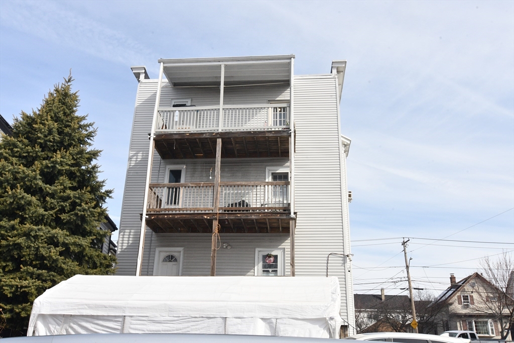 121 Cottage Street Everett, MA 02149 - Photo 5 of 35 a view of building exterior