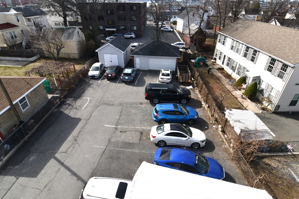 121 Cottage Street Everett, MA 02149 - Photo 6 of 35 a view of yard along with seating space