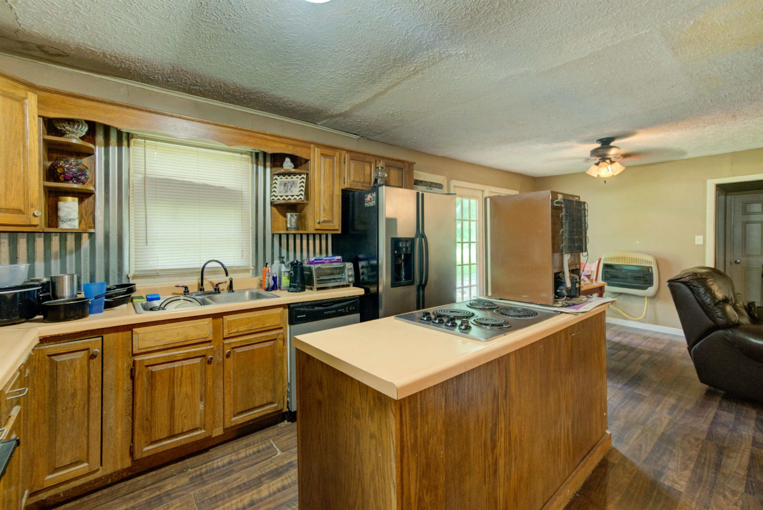 4066 Beech Bluff Road Beech Bluff, TN 38313 - Photo 3 of 14 a kitchen that has a sink and a stove in it