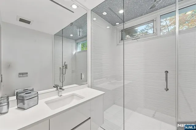 a view of a backyard with sitting area