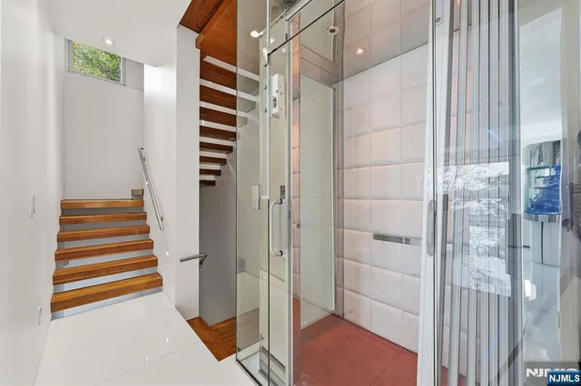 a view of entryway with stairs