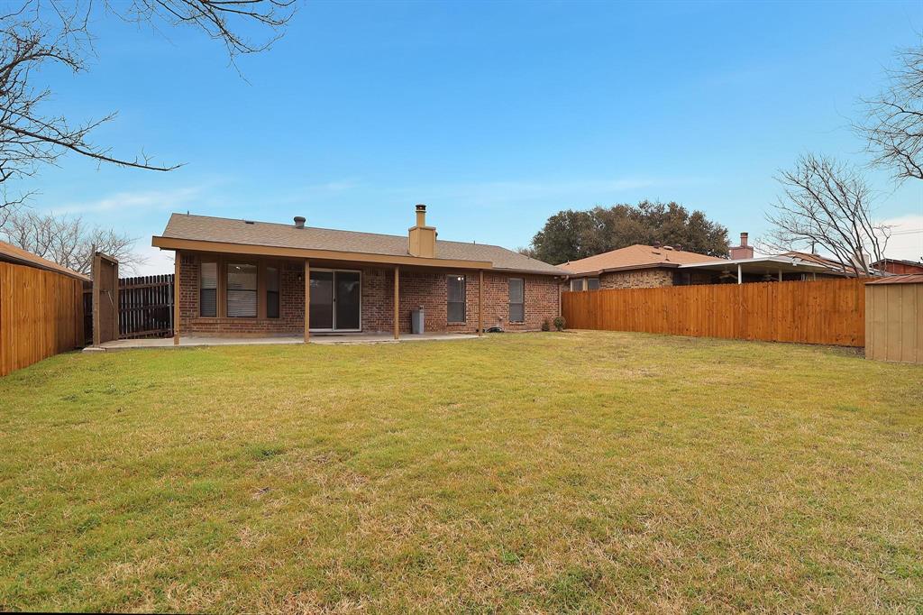 6632 Valley View Drive Watauga, TX 76148 - Photo 18 of 18 a front view of a house with a lake view