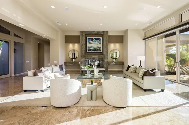 a dining room with furniture and wooden floor