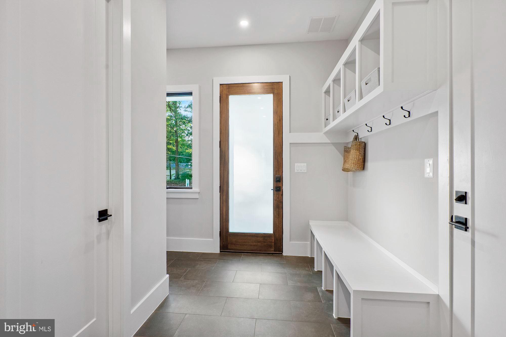 925 Saigon Road McLean, VA 22102 - Photo 42 of 50 Mudroom with Secondary Entrance & Cubbies
