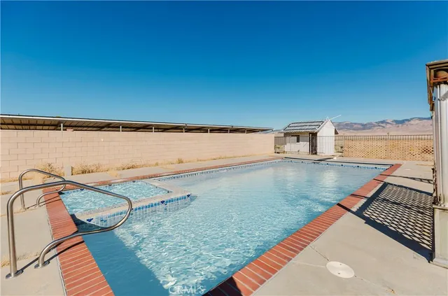 a view of room with stairs and closet