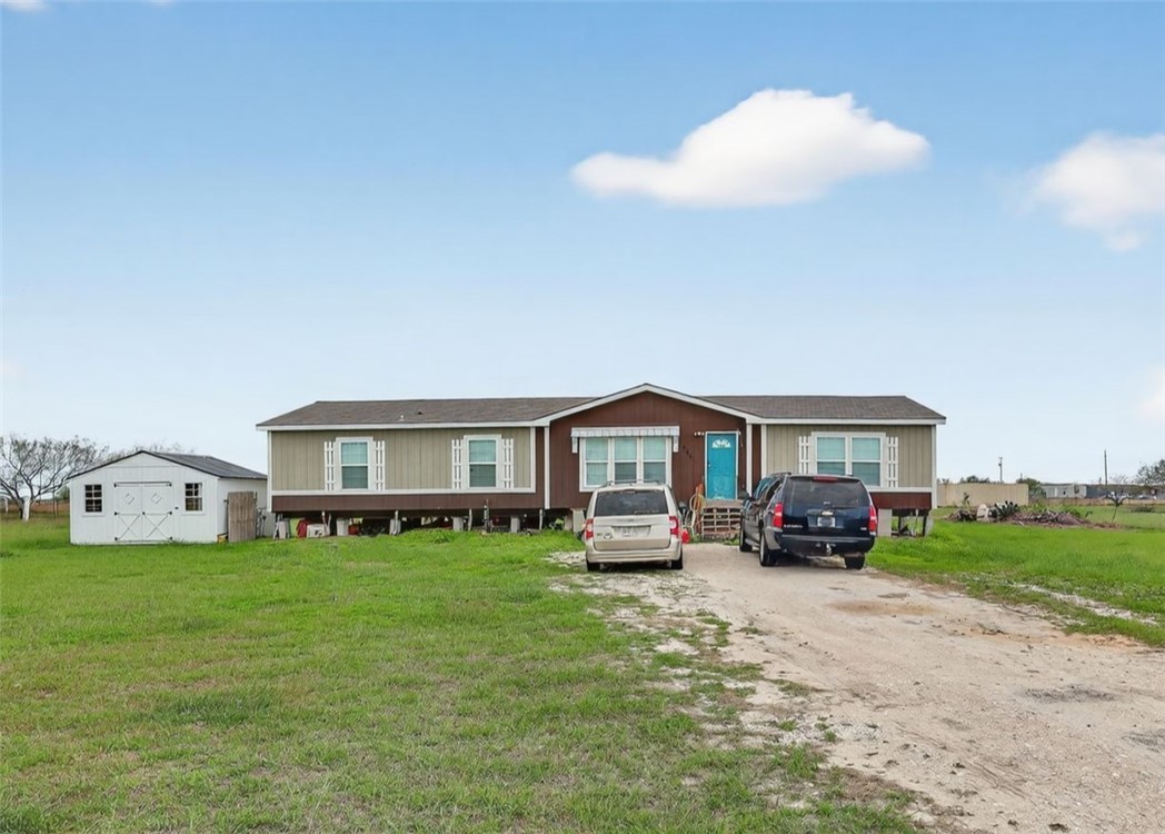 4046 Farm To Market 666 Robstown, TX 78380 - Photo 1 of 29 a view of a house with a yard and sitting area