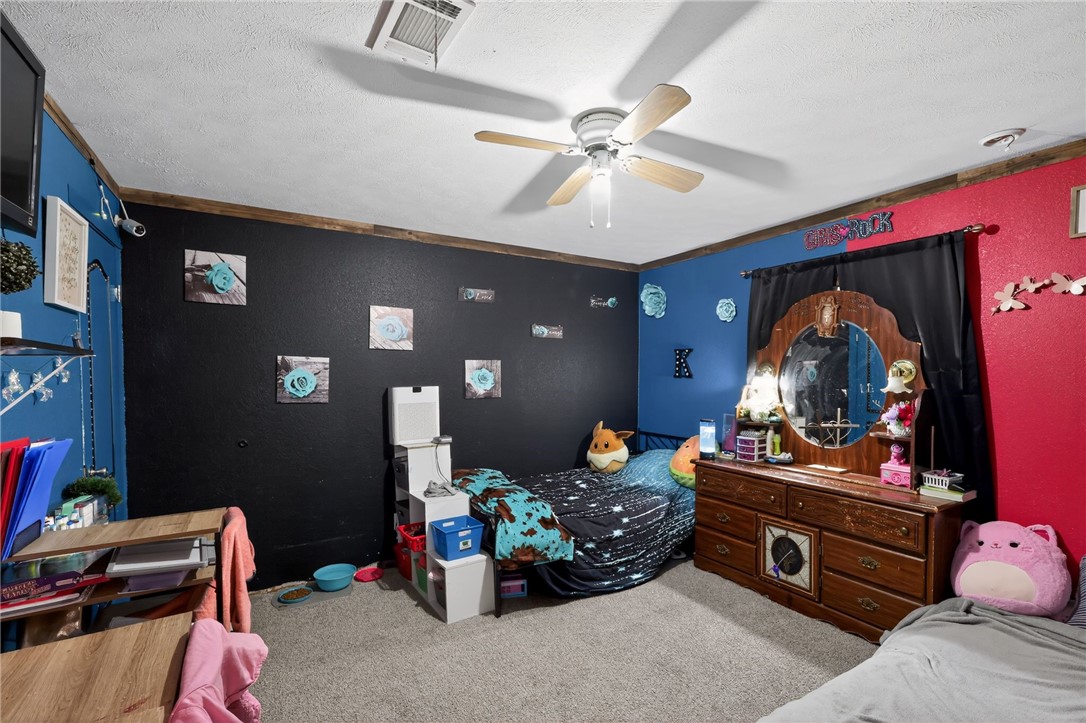 4046 Farm To Market 666 Robstown, TX 78380 - Photo 14 of 29 a room with furniture and chandelier fan