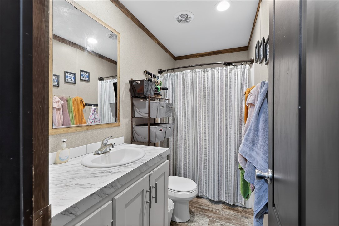 4046 Farm To Market 666 Robstown, TX 78380 - Photo 19 of 29 a bathroom with a sink toilet and shower