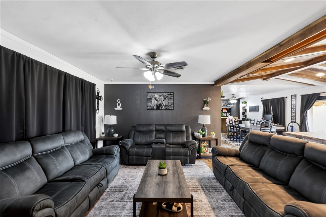 4046 Farm To Market 666 Robstown, TX 78380 - Photo 2 of 29 a living room with furniture and a chandelier