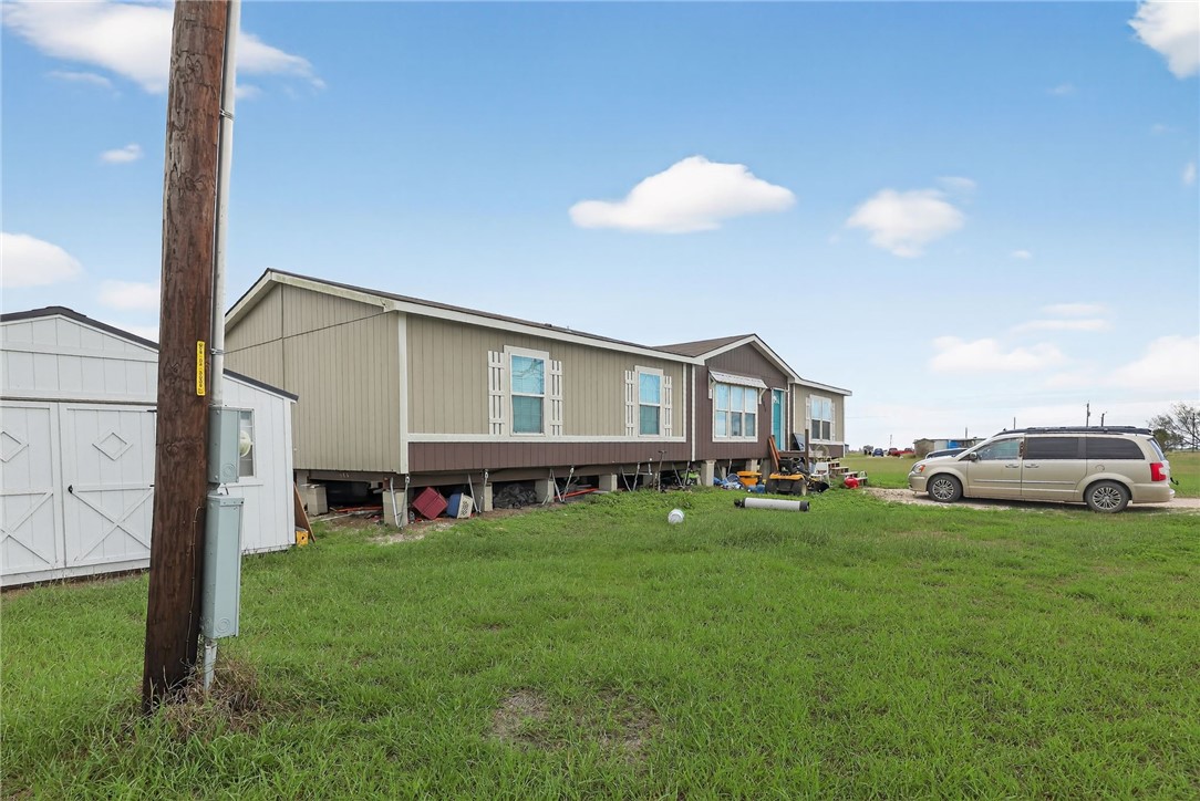 4046 Farm To Market 666 Robstown, TX 78380 - Photo 25 of 29 a view of a house with a yard and sitting area