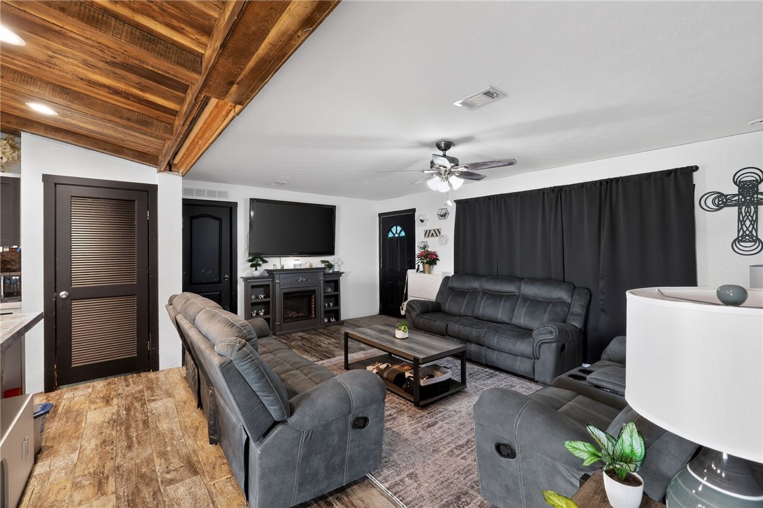 4046 Farm To Market 666 Robstown, TX 78380 - Photo 4 of 29 a living room with furniture and a flat screen tv