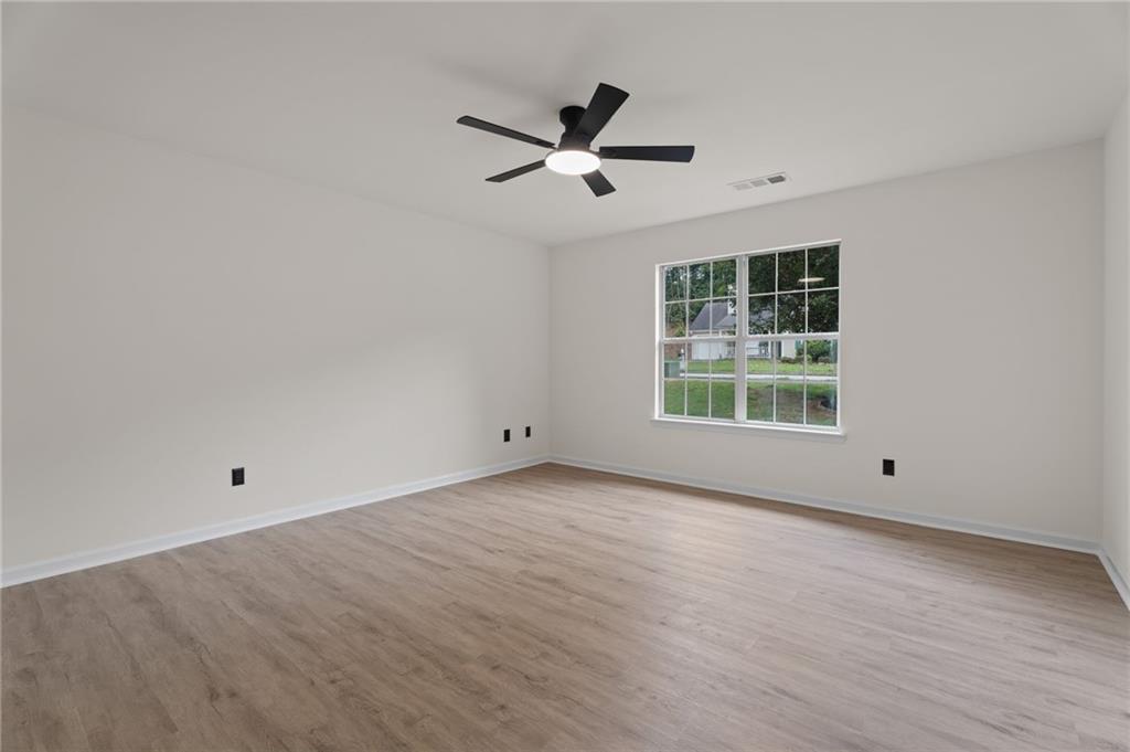 3602 Bristol Overlook Rex, GA 30273 - Photo 26 of 37 wooden floor in an empty room with a window