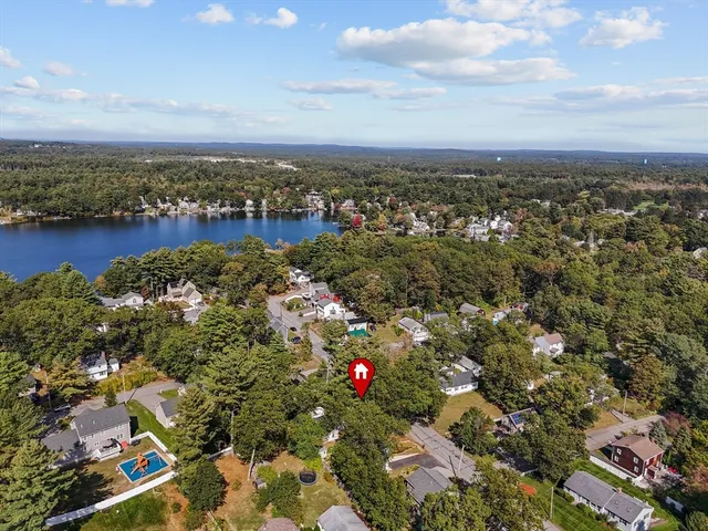 an aerial view of city and lake