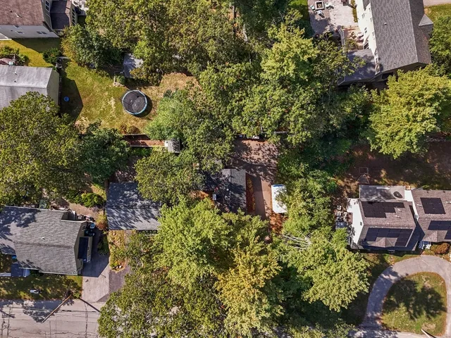 a view of a balcony with wooden floor