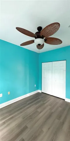 a view of a room with a walk in closet and entryway