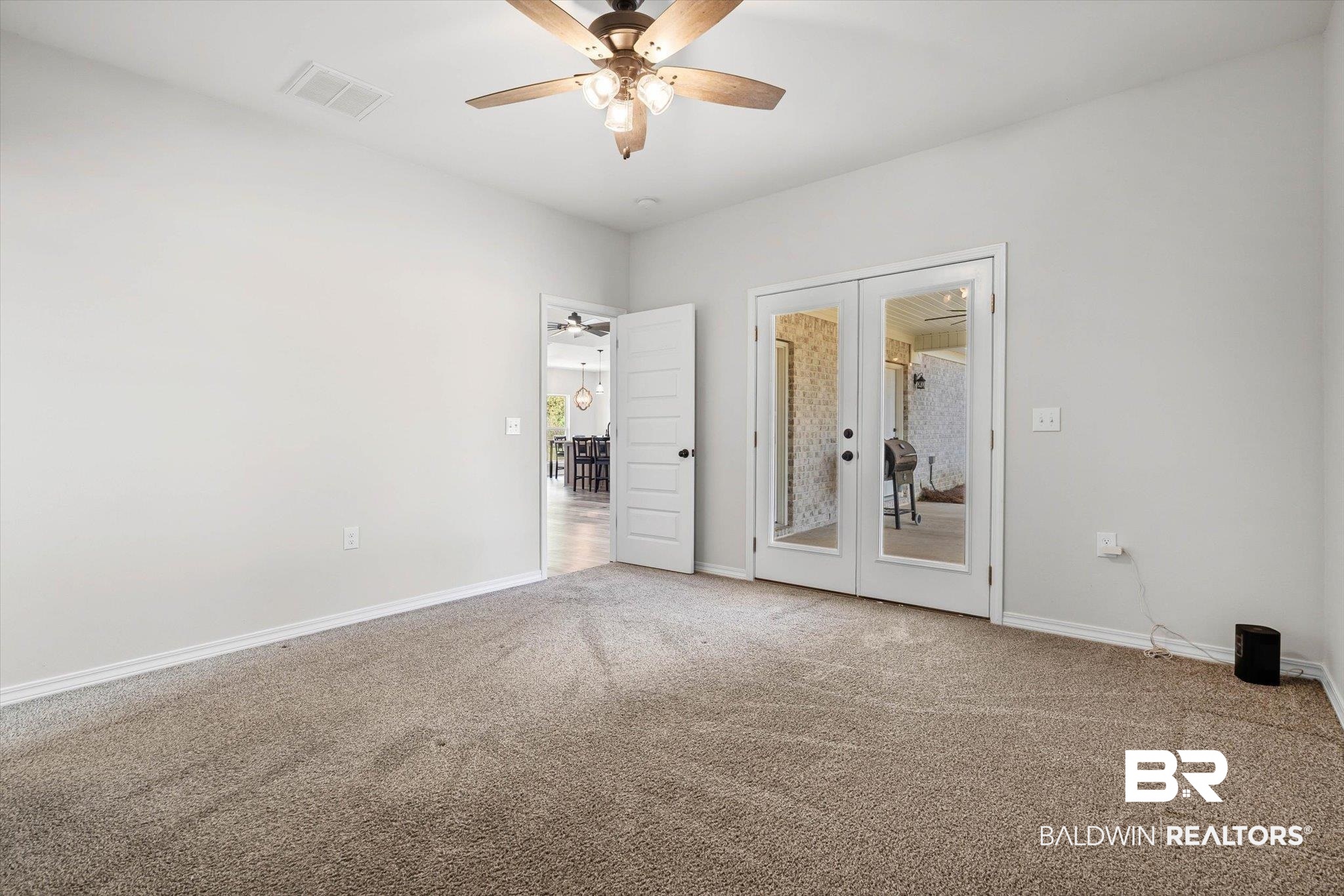 13198 Gopher Court Elberta, AL 36530 - Photo 11 of 37 2nd Bedroom with French Doors to Back Porch