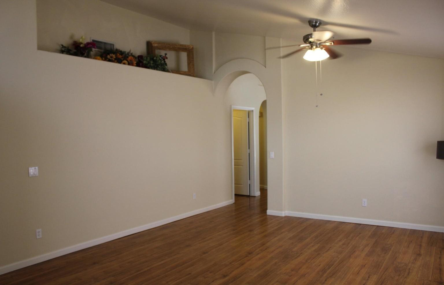 9456 East Pine Valley Road Scottsdale, AZ 85260 - Photo 8 of 18 a view of a room with wooden floor