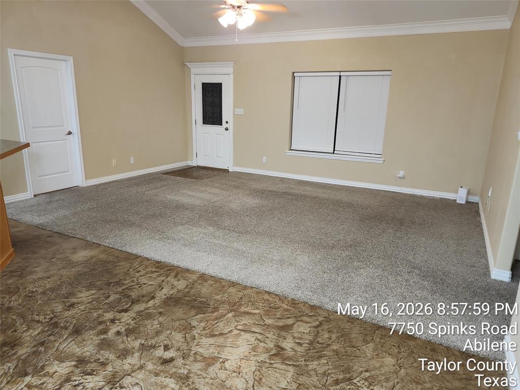7750 Spinks Road Abilene, TX 79603 - Photo 4 of 15 an empty room with windows