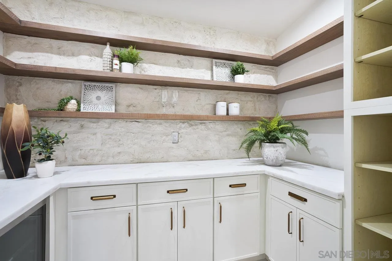 8843 Mariposa Street La Mesa, CA 91941 - Photo 15 of 60 a view of kitchen with cabinets