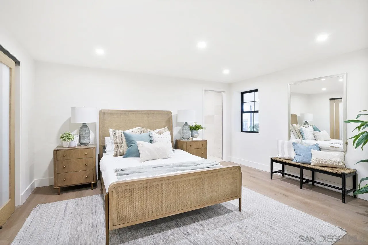 8843 Mariposa Street La Mesa, CA 91941 - Photo 32 of 60 a bedroom with a bed and a table