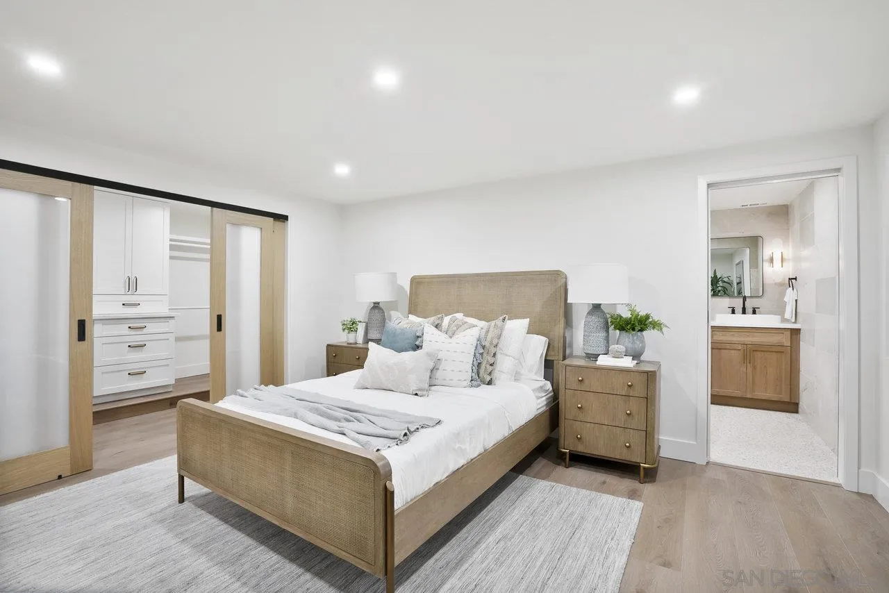 8843 Mariposa Street La Mesa, CA 91941 - Photo 33 of 60 a bedroom with a bed and a couch