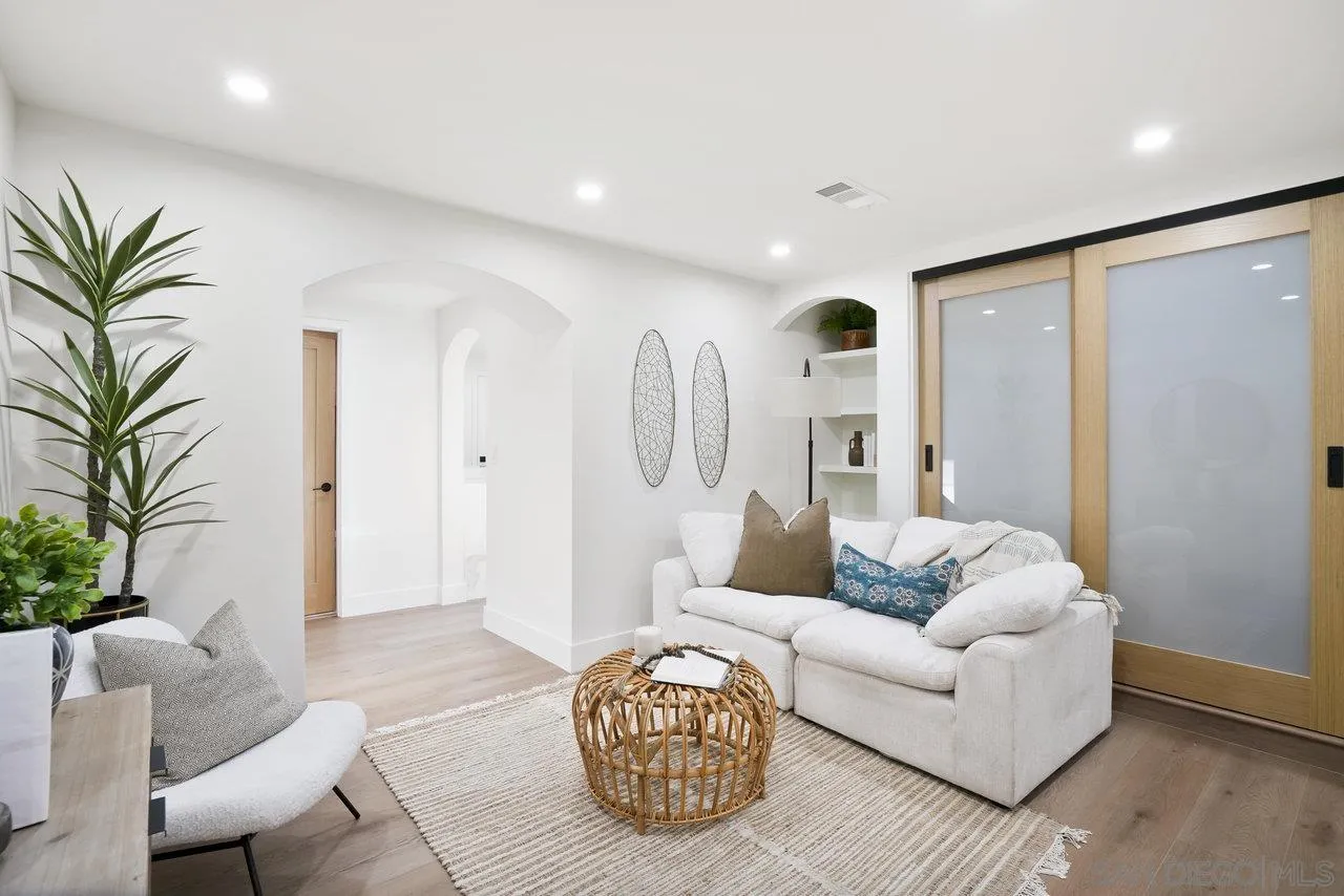 8843 Mariposa Street La Mesa, CA 91941 - Photo 39 of 60 a living room with furniture and a large window