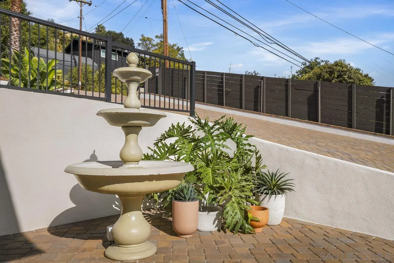 8843 Mariposa Street La Mesa, CA 91941 - Photo 49 of 60 a view of a porch with furniture and wooden floor