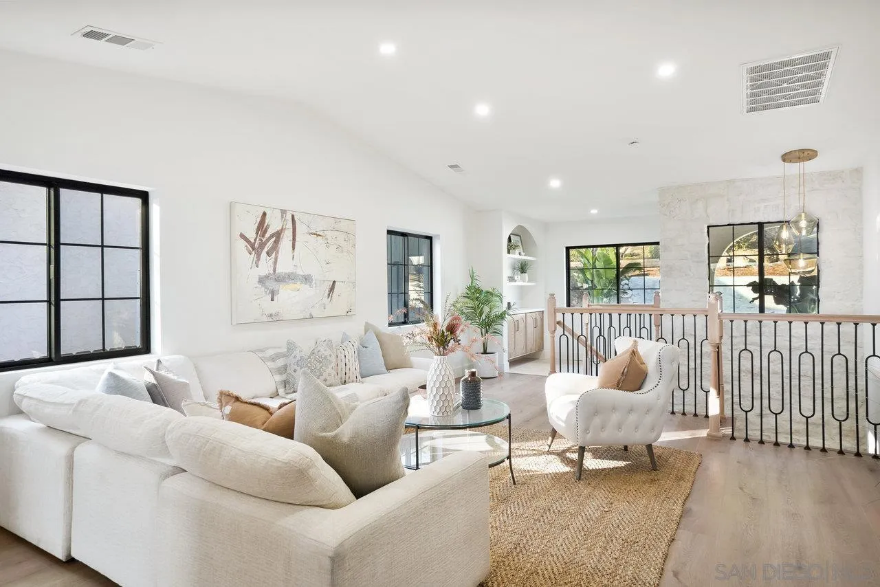 8843 Mariposa Street La Mesa, CA 91941 - Photo 7 of 60 a living room with furniture and a wooden floor