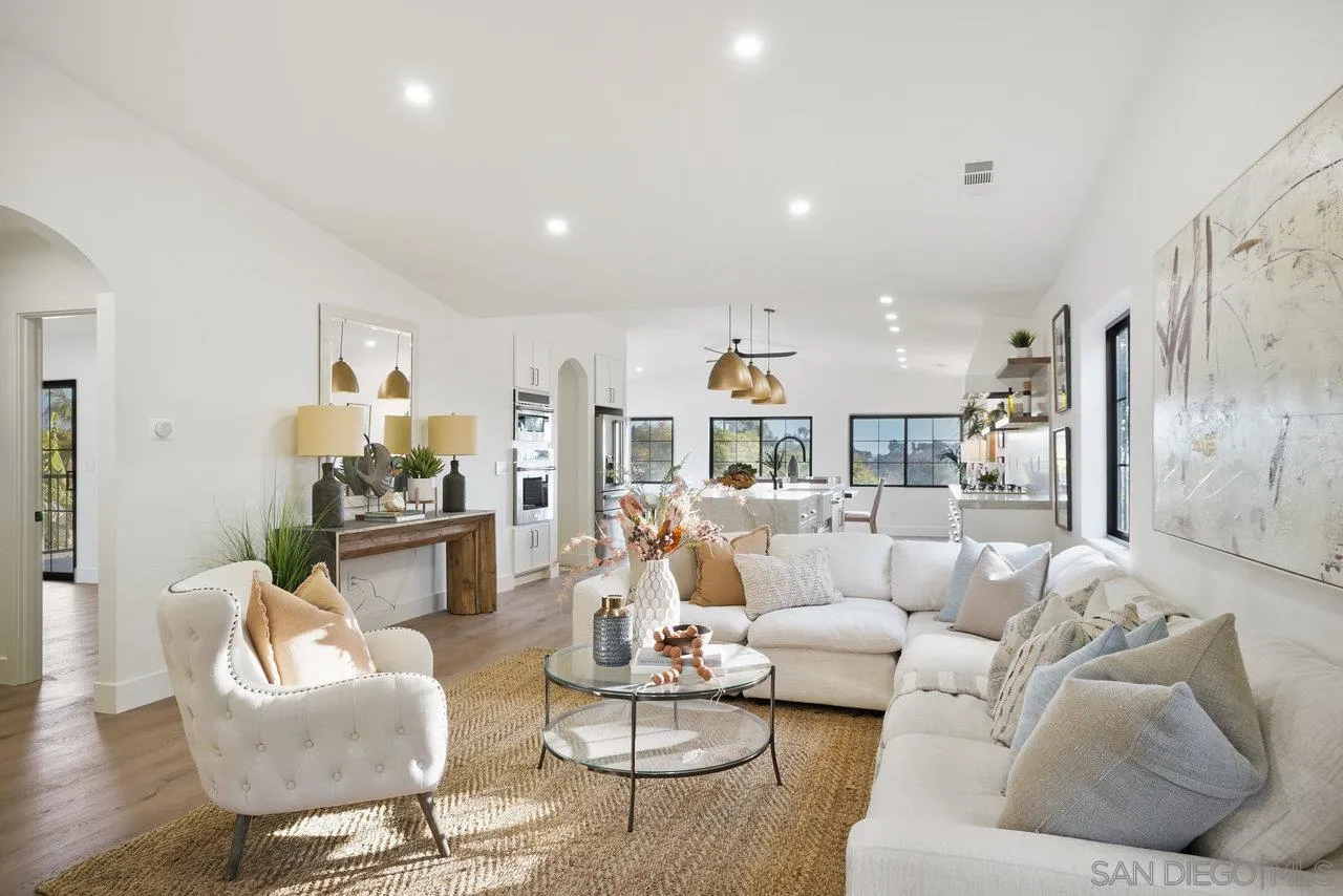 8843 Mariposa Street La Mesa, CA 91941 - Photo 8 of 60 a living room with furniture and a table