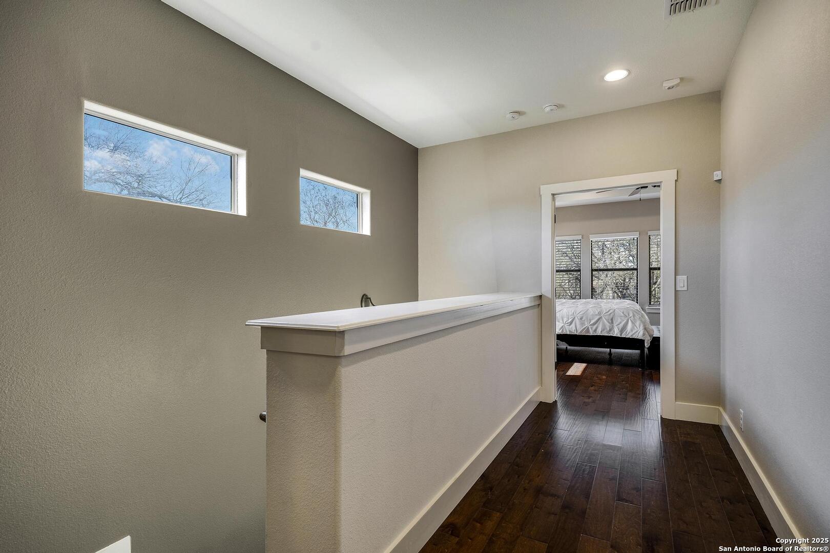 630 3 Oaks Road Seguin, TX 78155 - Photo 15 of 36 a view of hallway with wooden floor