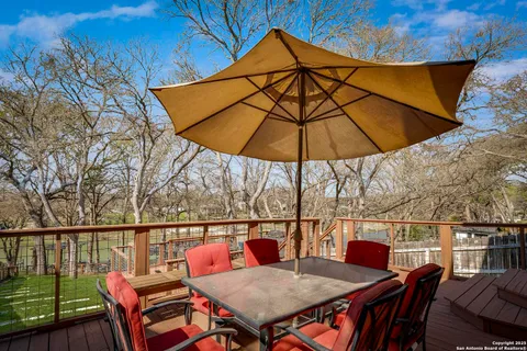 a view of a yard with trees