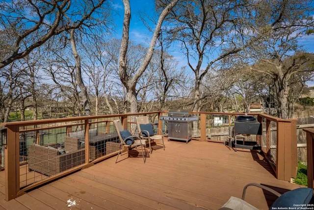 a view of a balcony with furniture