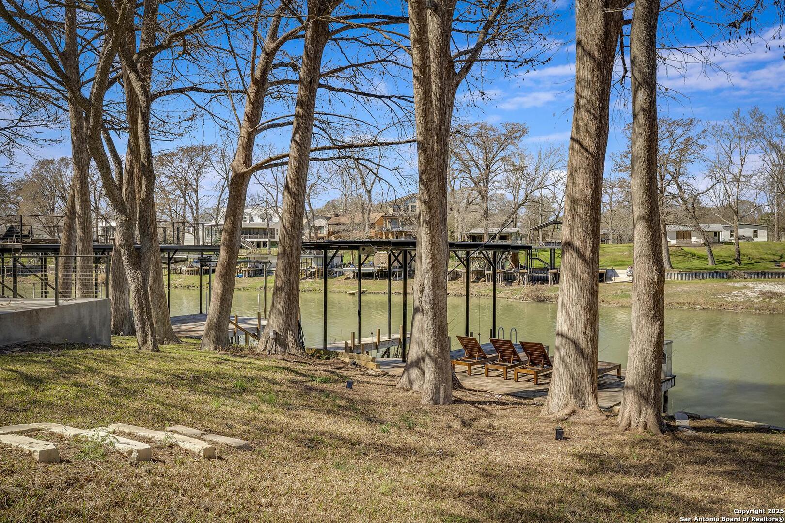 630 3 Oaks Road Seguin, TX 78155 - Photo 31 of 36 a view of a backyard of the house