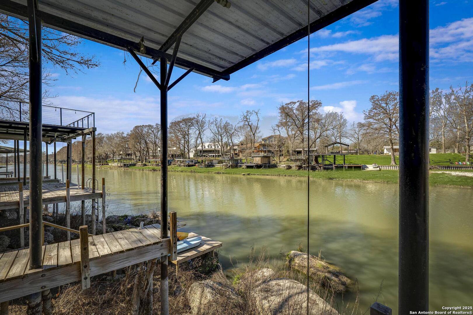 630 3 Oaks Road Seguin, TX 78155 - Photo 34 of 36 a view of a lake from a balcony