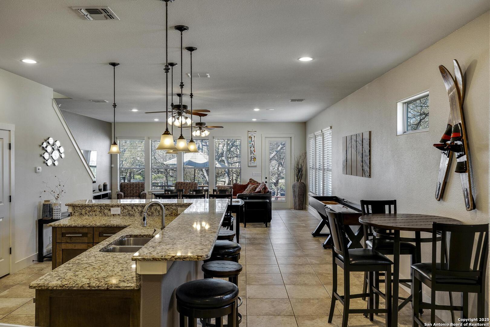 630 3 Oaks Road Seguin, TX 78155 - Photo 4 of 36 a view of a dining room with furniture