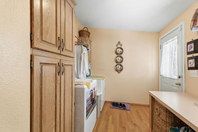 a room with a window and a wooden floor