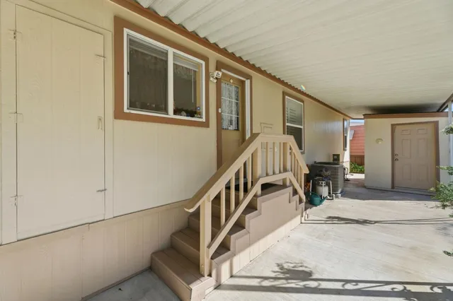 a view of entryway livingroom and hall