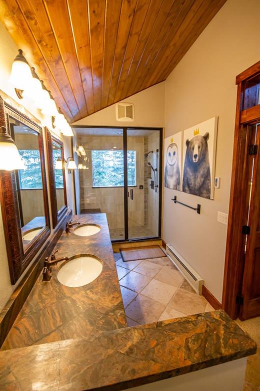 37 Wintergreen Circle Keystone, CO 80435 - Photo 12 of 35 a room with wooden floor and furniture