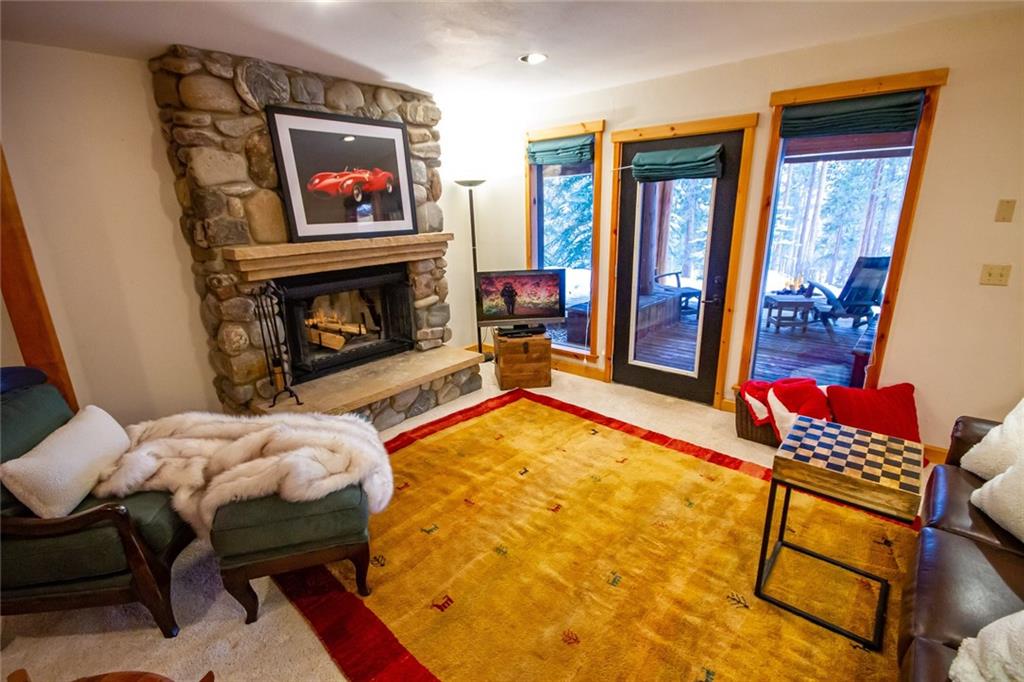 37 Wintergreen Circle Keystone, CO 80435 - Photo 15 of 35 a bedroom with furniture and a fireplace