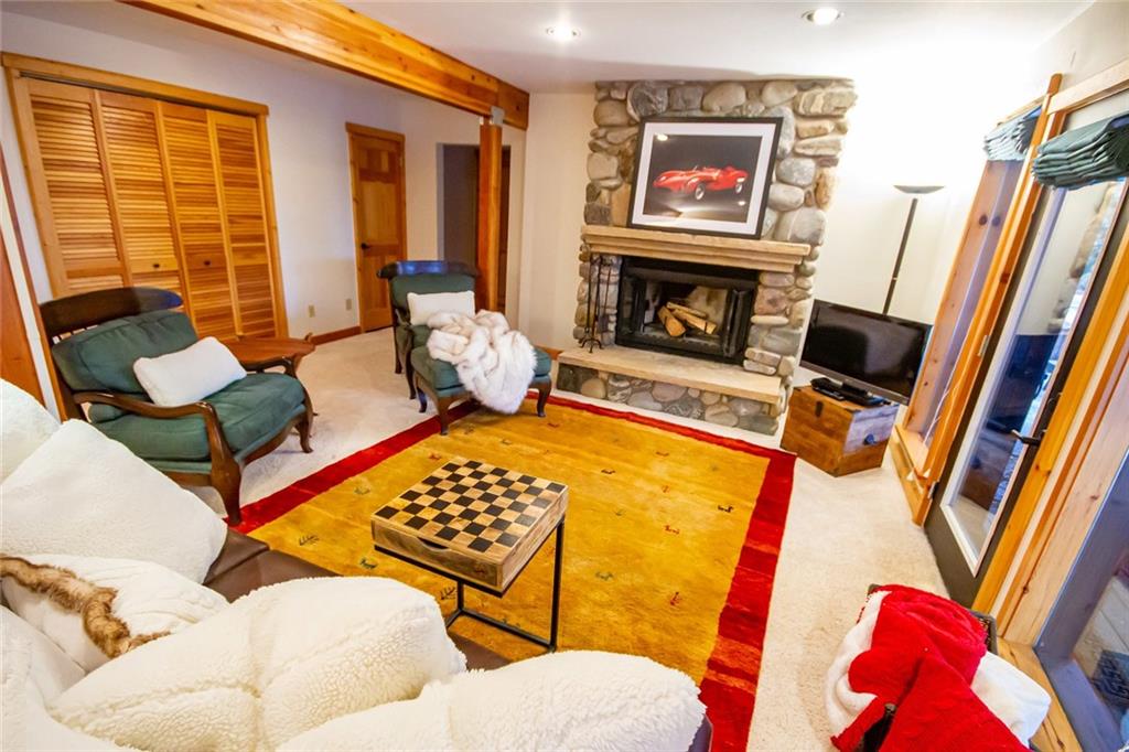 37 Wintergreen Circle Keystone, CO 80435 - Photo 19 of 35 a living room with furniture and a fireplace