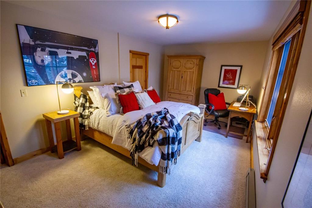 37 Wintergreen Circle Keystone, CO 80435 - Photo 21 of 35 a bedroom with a bed and a window
