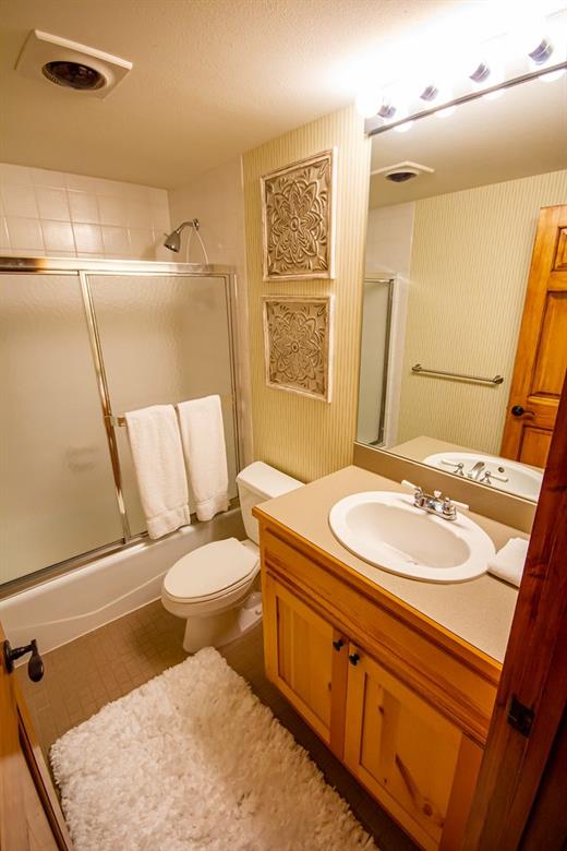37 Wintergreen Circle Keystone, CO 80435 - Photo 25 of 35 a bathroom with a sink and a mirror