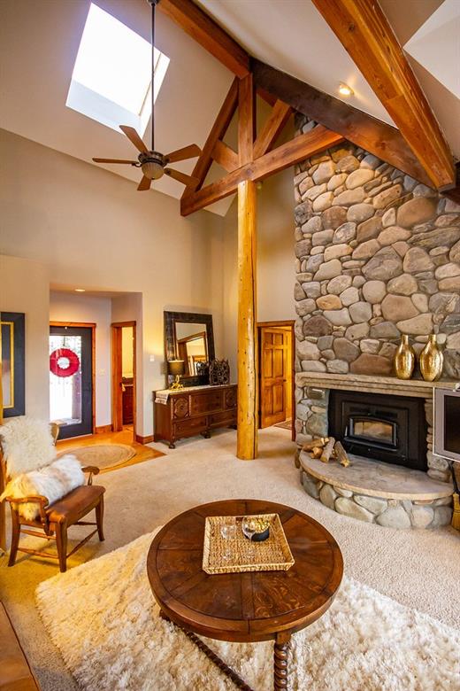 37 Wintergreen Circle Keystone, CO 80435 - Photo 4 of 35 a living room with furniture and a fireplace