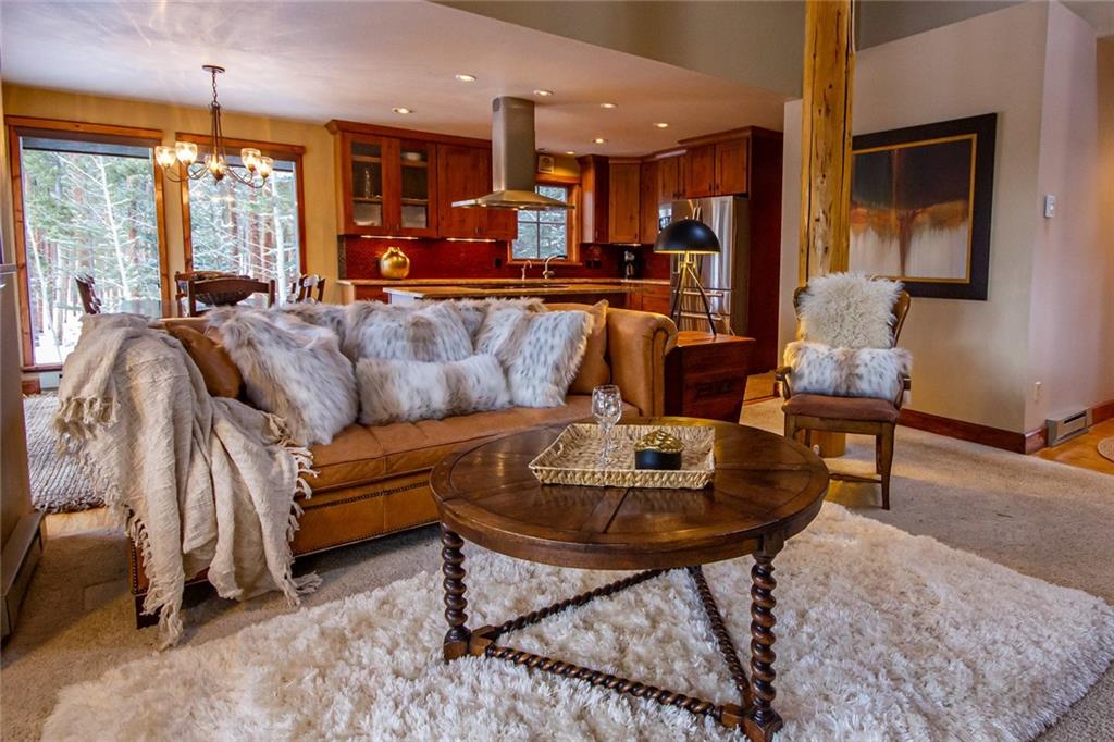 37 Wintergreen Circle Keystone, CO 80435 - Photo 7 of 35 a living room with furniture and a large window