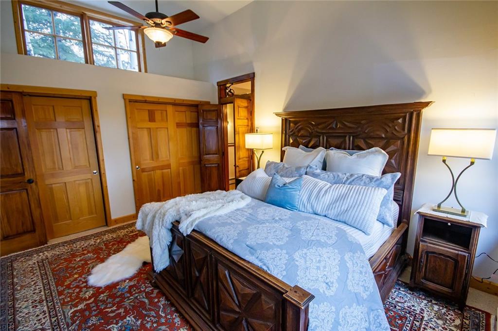 37 Wintergreen Circle Keystone, CO 80435 - Photo 10 of 35 a bedroom with a bed and a television