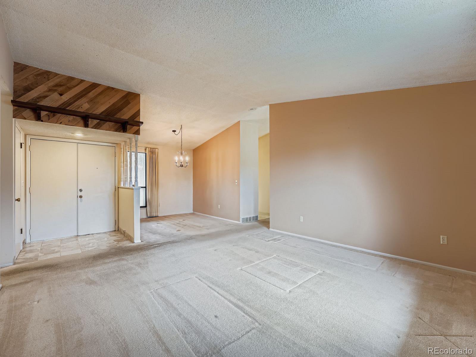 3447 South Norfolk Way Aurora, CO 80013 - Photo 4 of 14 a view of empty room