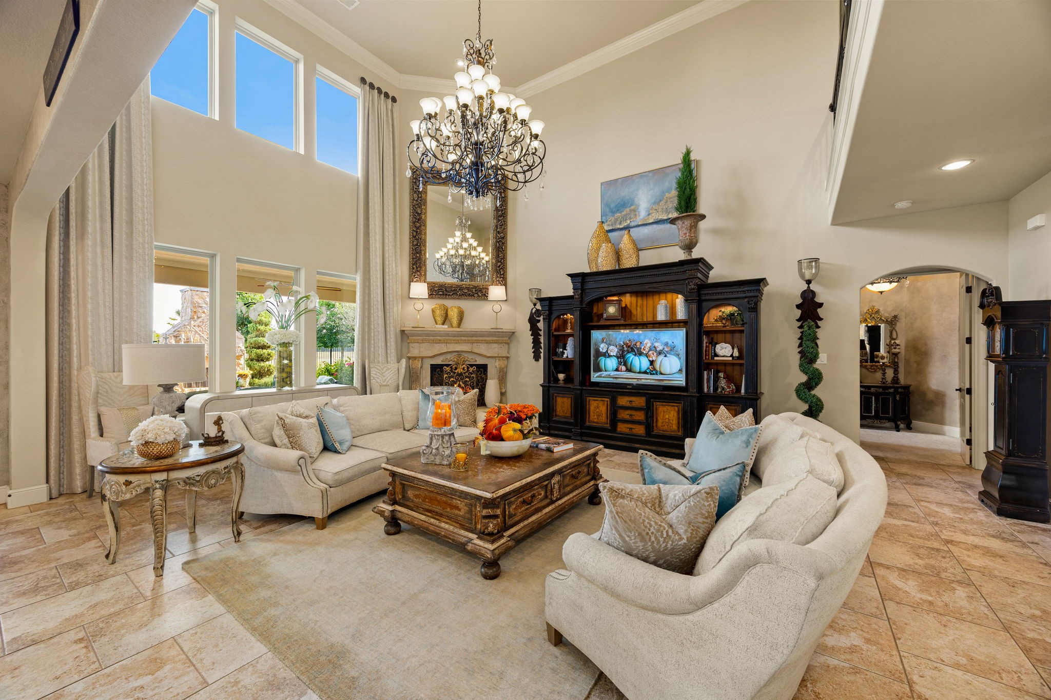 26515 Ashley Ridge Lane Katy, TX 77494 - Photo 11 of 50 a living room with fireplace furniture and a chandelier