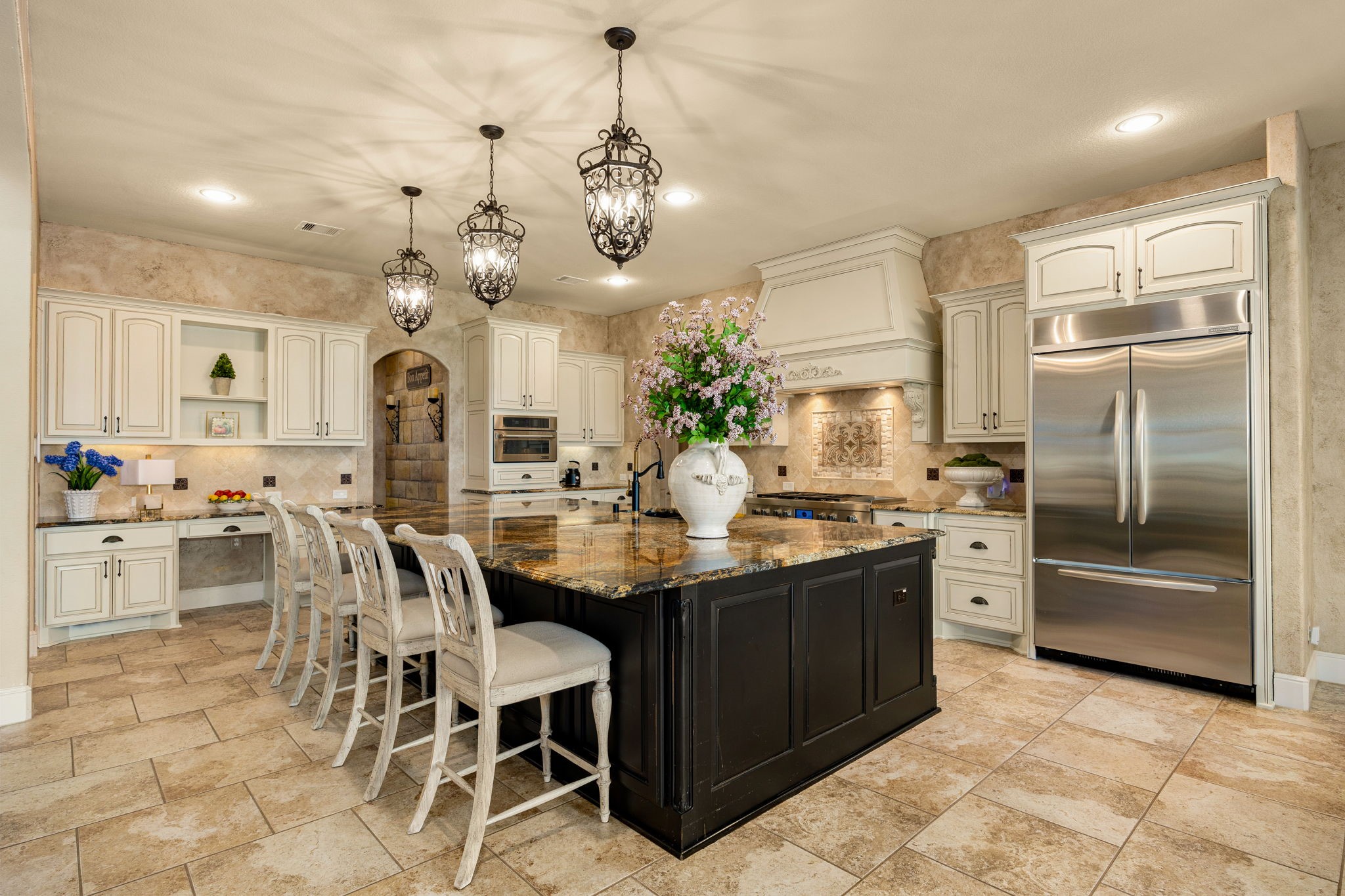 26515 Ashley Ridge Lane Katy, TX 77494 - Photo 14 of 50 a kitchen with stainless steel appliances kitchen island granite countertop a sink and cabinets